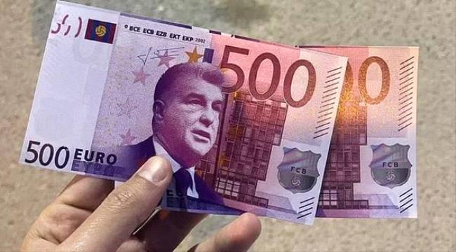 جماهير ريال مدريد تتظاهر بنقود تحمل صور لابورتا لهذا السبب "فيديو"